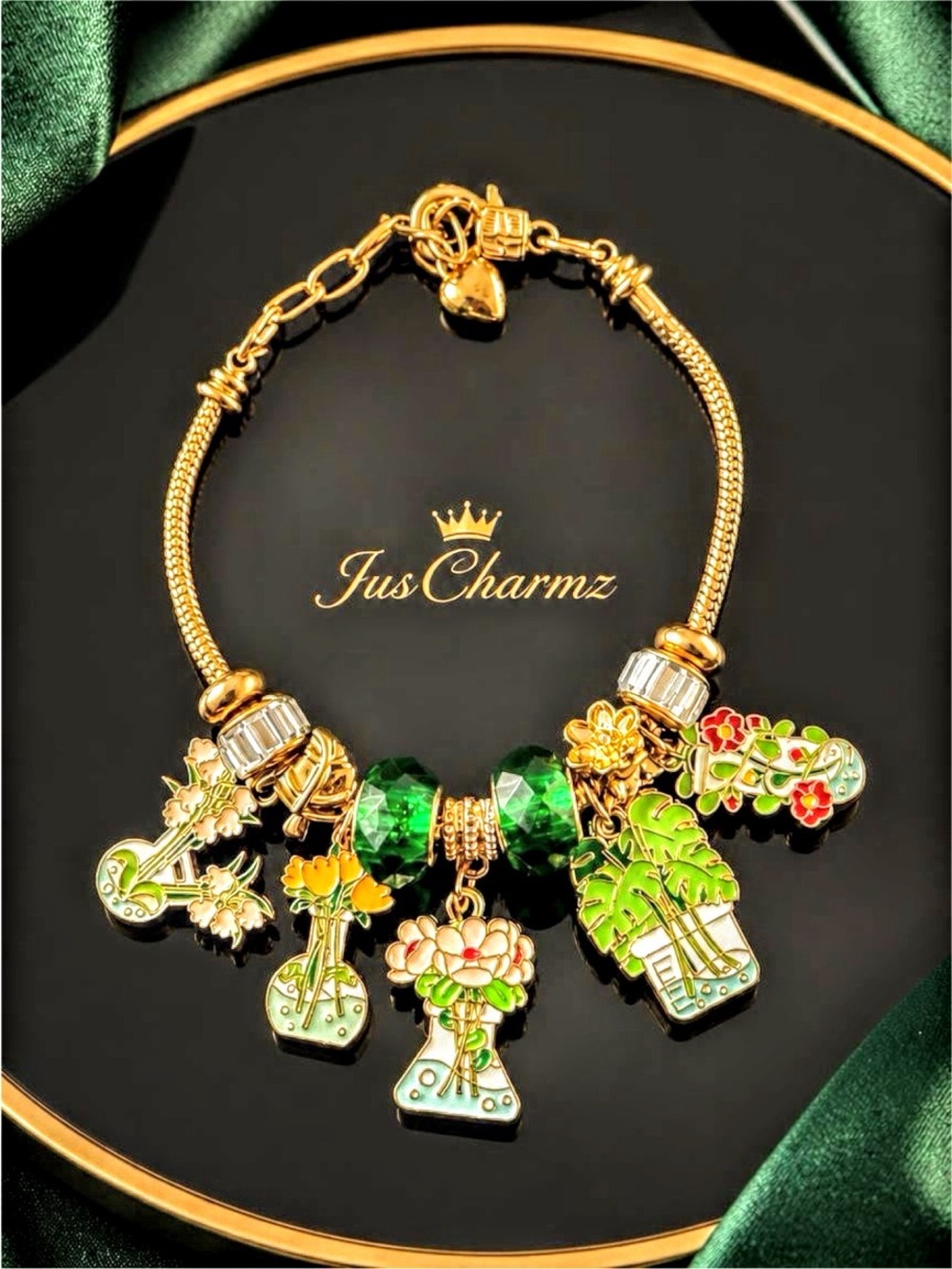 Gold Bracelet with Green Crystal Beads & Floral Charms